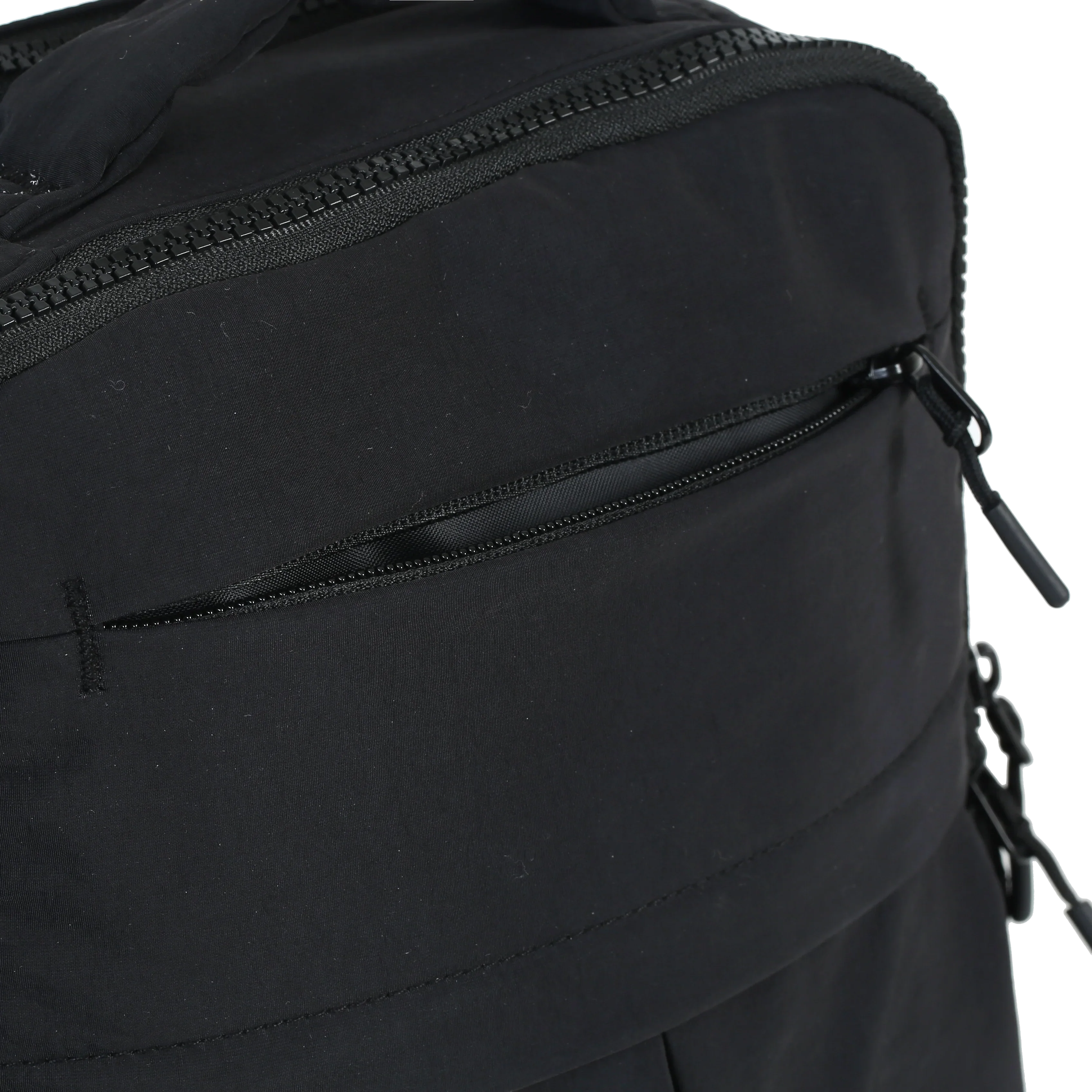 Minimax - The Roomiest Mini Backpack
